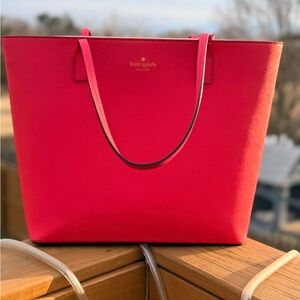 kate spade bright pink tote with gold logo